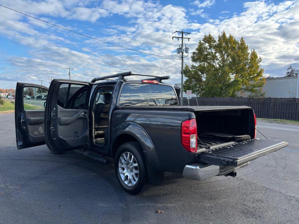 used 2010 Nissan Frontier car, priced at $9,999