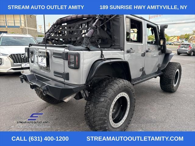 used 2016 Jeep Wrangler Unlimited car, priced at $22,998