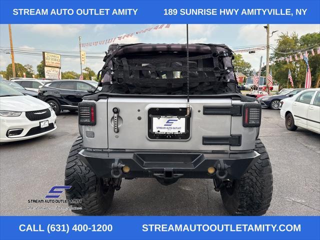 used 2016 Jeep Wrangler Unlimited car, priced at $22,998
