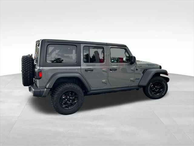 used 2023 Jeep Wrangler 4xe car, priced at $30,936