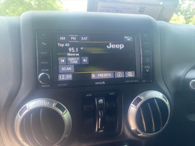 used 2016 Jeep Wrangler Unlimited car, priced at $28,960