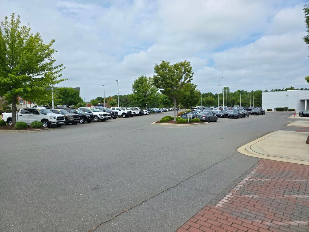 used 2024 Volkswagen Taos car, priced at $23,615