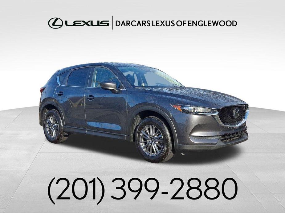 used 2021 Mazda CX-5 car, priced at $18,000