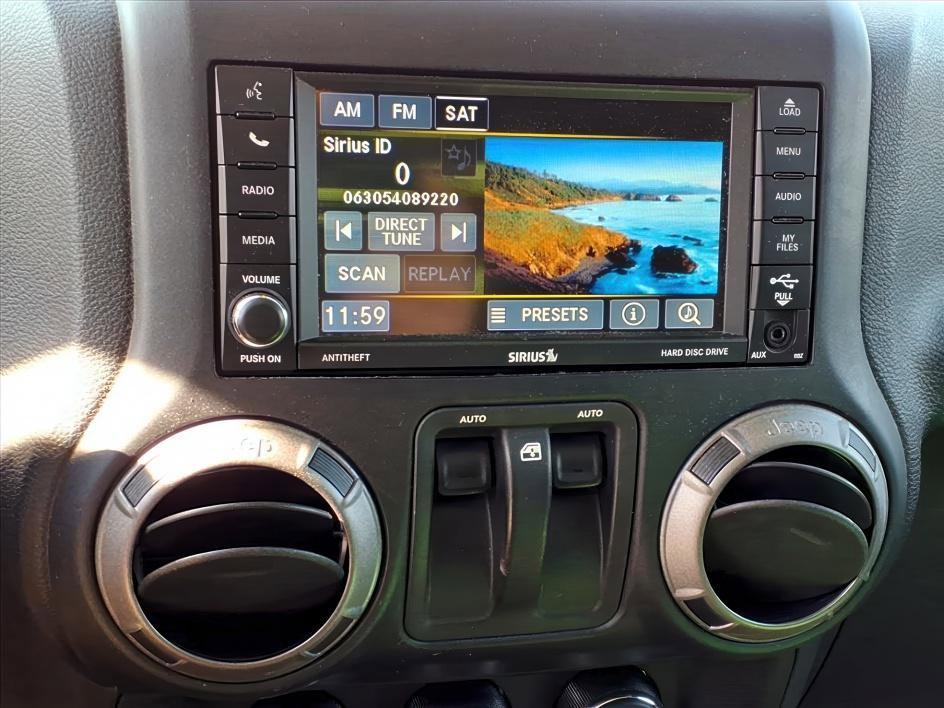 used 2015 Jeep Wrangler car, priced at $17,898