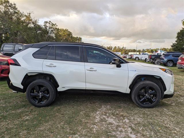 used 2021 Toyota RAV4 Hybrid car, priced at $27,293