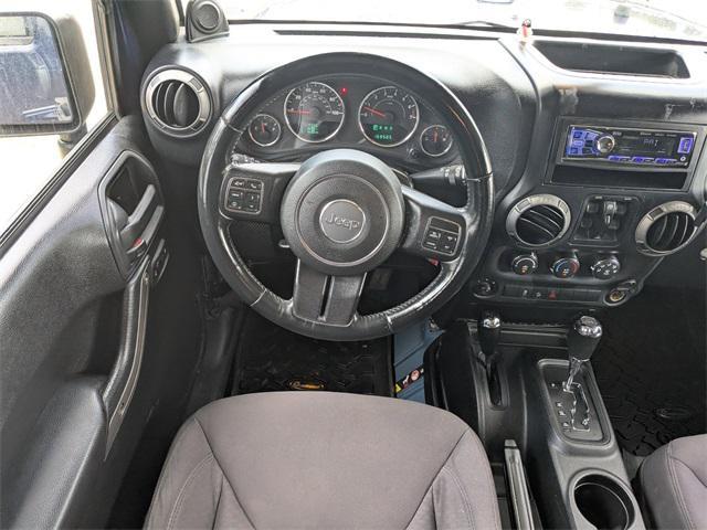 used 2013 Jeep Wrangler Unlimited car, priced at $11,139