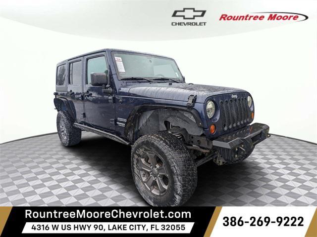 used 2013 Jeep Wrangler Unlimited car, priced at $12,785