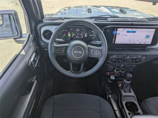 used 2024 Jeep Wrangler 4xe car, priced at $37,155