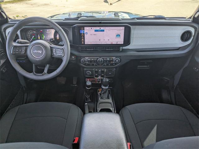 used 2024 Jeep Wrangler 4xe car, priced at $37,155