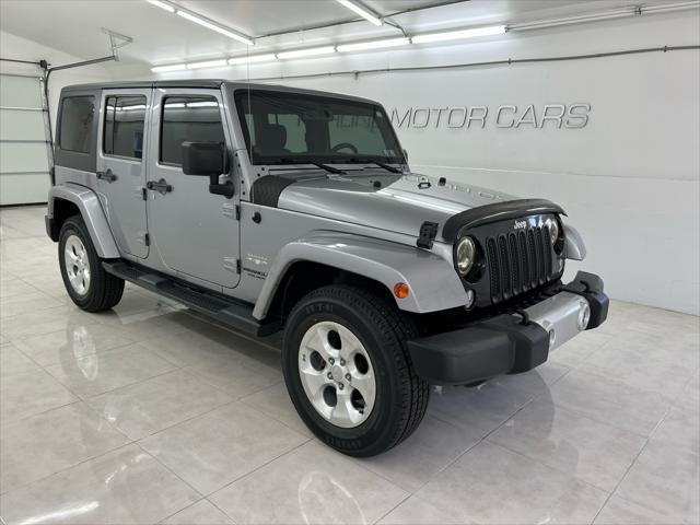 used 2014 Jeep Wrangler Unlimited car, priced at $17,995