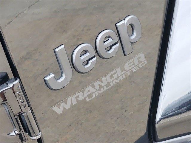 used 2021 Jeep Wrangler Unlimited car, priced at $35,239