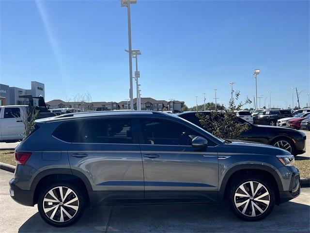 used 2023 Volkswagen Taos car, priced at $23,197