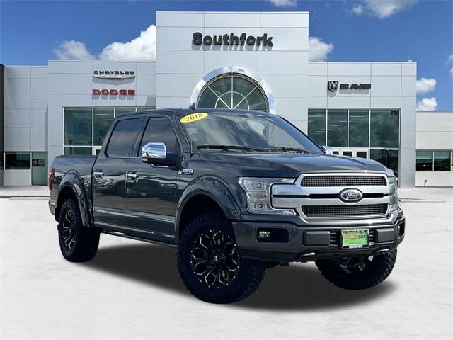 used 2018 Ford F-150 car, priced at $33,497