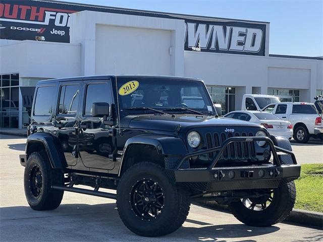 used 2013 Jeep Wrangler Unlimited car, priced at $16,899