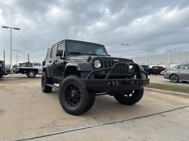 used 2013 Jeep Wrangler Unlimited car, priced at $17,399