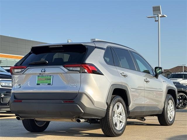 used 2021 Toyota RAV4 Hybrid car, priced at $25,197