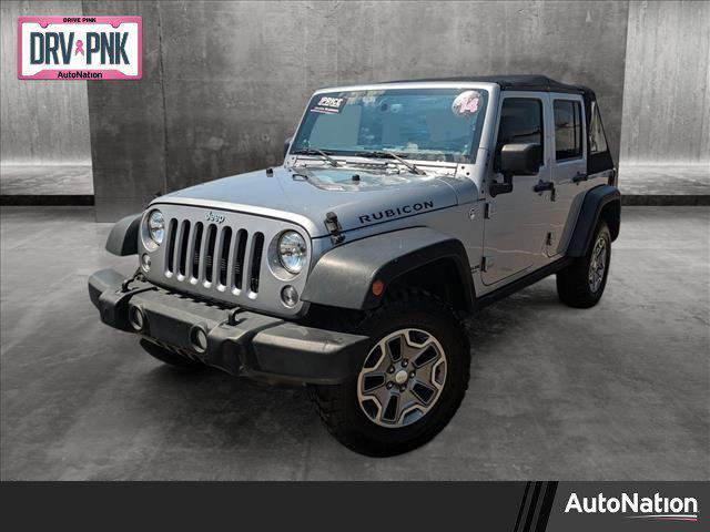 used 2014 Jeep Wrangler Unlimited car, priced at $23,498