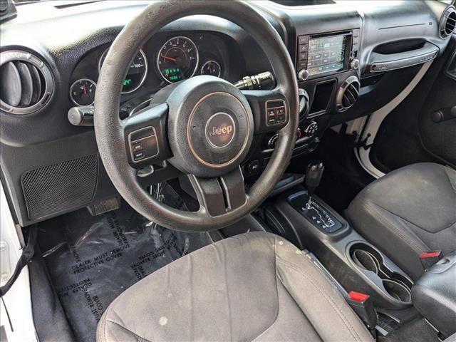 used 2013 Jeep Wrangler Unlimited car, priced at $18,978