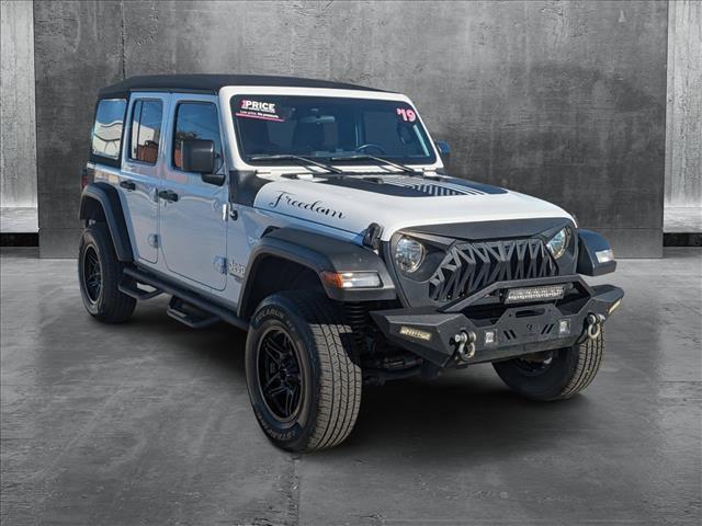 used 2019 Jeep Wrangler Unlimited car, priced at $23,240