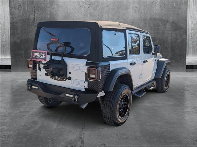 used 2019 Jeep Wrangler Unlimited car, priced at $23,240