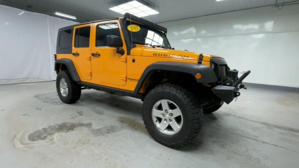 used 2012 Jeep Wrangler Unlimited car, priced at $17,900
