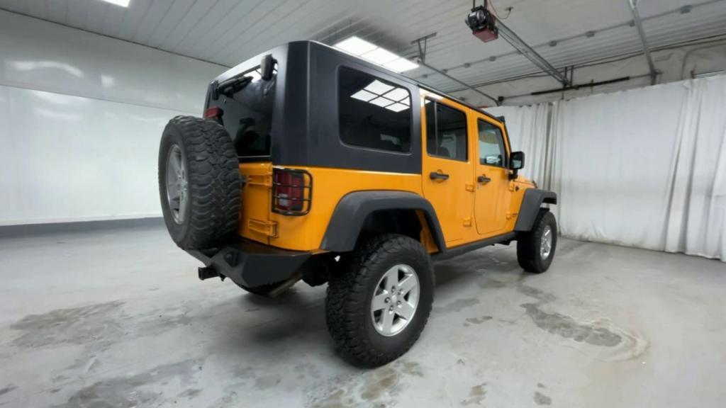 used 2012 Jeep Wrangler Unlimited car, priced at $17,900