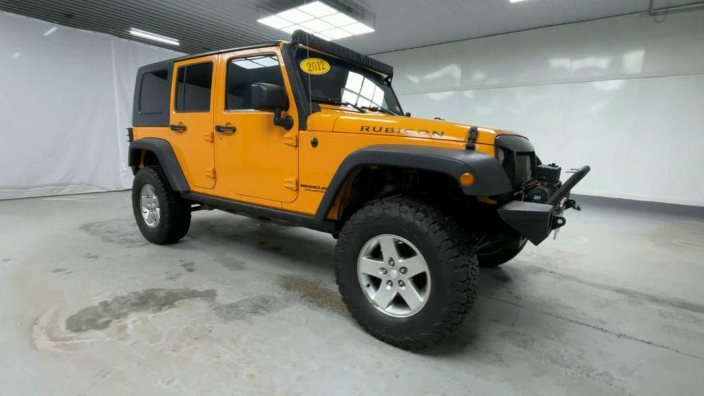 used 2012 Jeep Wrangler Unlimited car, priced at $21,755