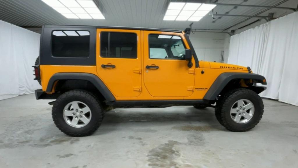 used 2012 Jeep Wrangler Unlimited car, priced at $17,900