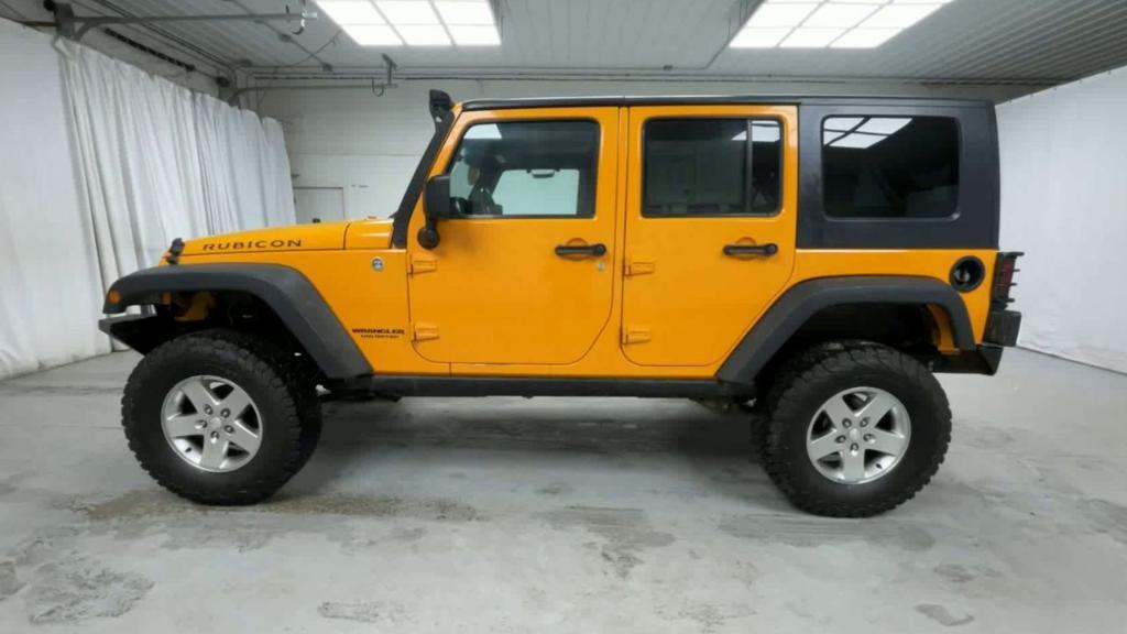 used 2012 Jeep Wrangler Unlimited car, priced at $17,900