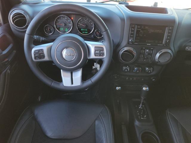 used 2017 Jeep Wrangler Unlimited car, priced at $23,174