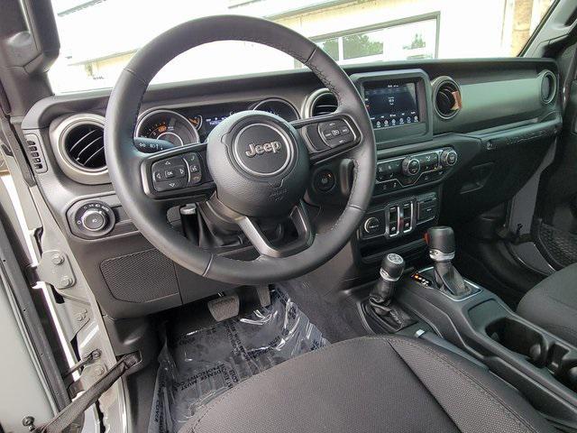 used 2023 Jeep Wrangler car, priced at $32,174