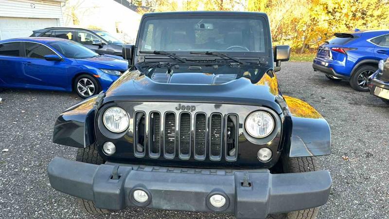 used 2015 Jeep Wrangler Unlimited car, priced at $13,999