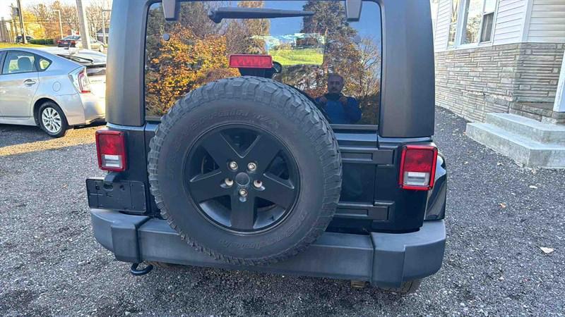 used 2015 Jeep Wrangler Unlimited car, priced at $13,999