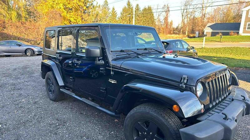 used 2015 Jeep Wrangler Unlimited car, priced at $13,999