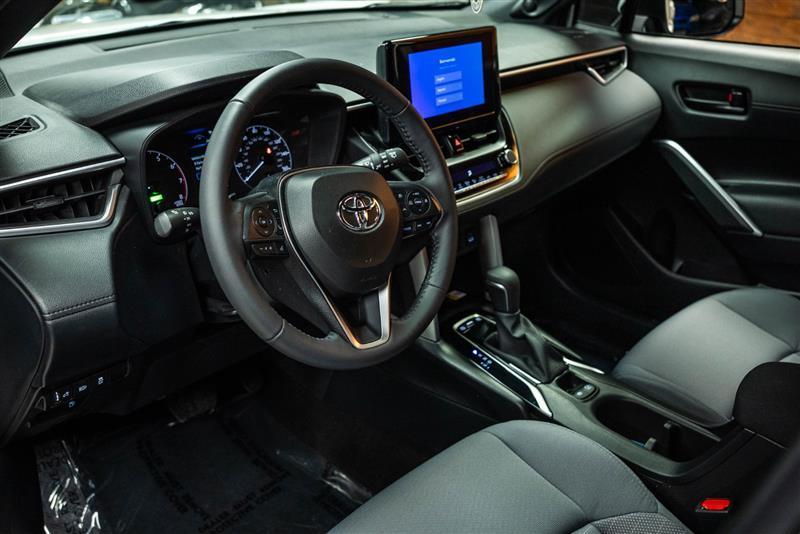 used 2023 Toyota Corolla Cross Hybrid car, priced at $30,895