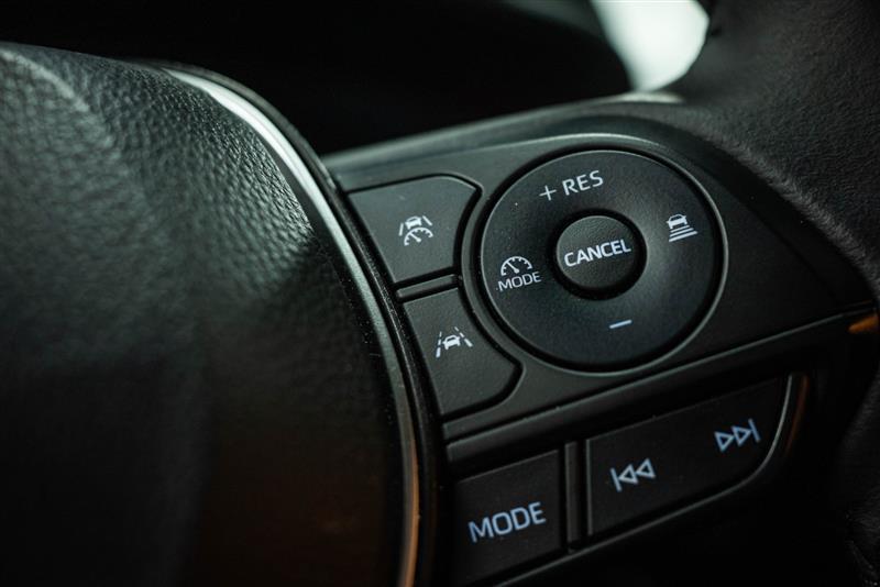 used 2023 Toyota Corolla Cross Hybrid car, priced at $30,895