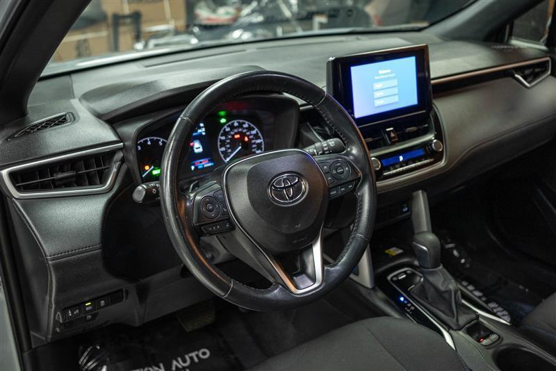 used 2023 Toyota Corolla Cross Hybrid car, priced at $30,546