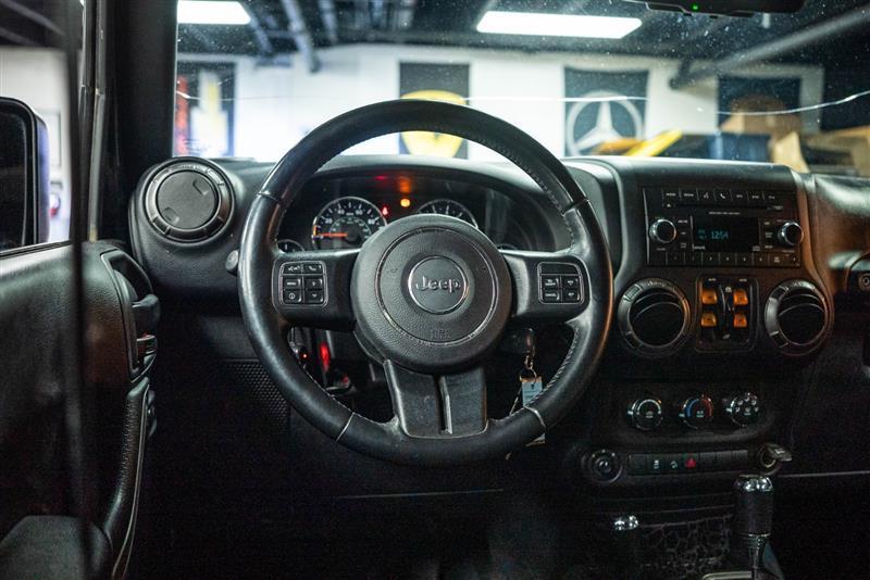 used 2018 Jeep Wrangler JK Unlimited car, priced at $21,995