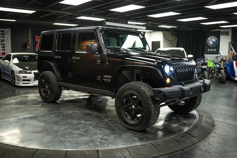 used 2018 Jeep Wrangler JK Unlimited car, priced at $21,995