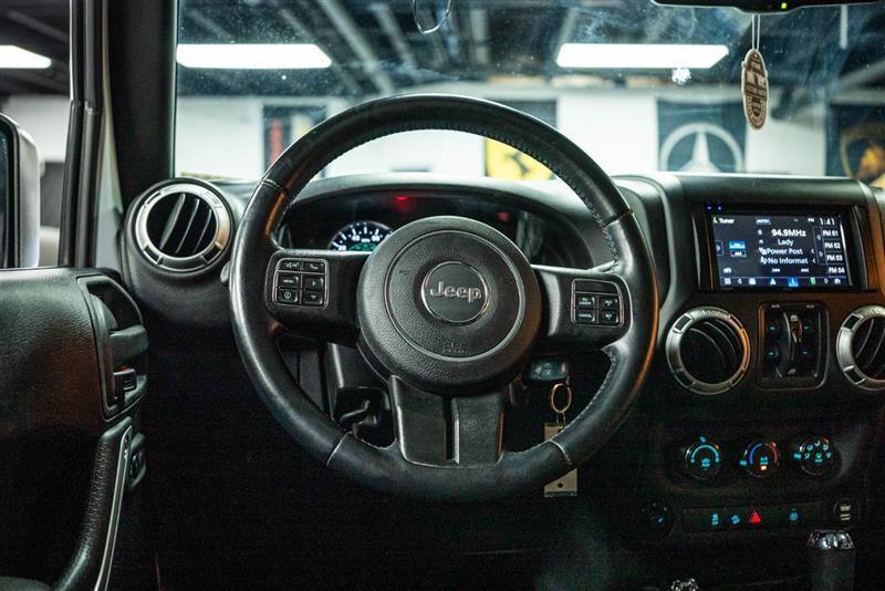 used 2016 Jeep Wrangler Unlimited car, priced at $20,197