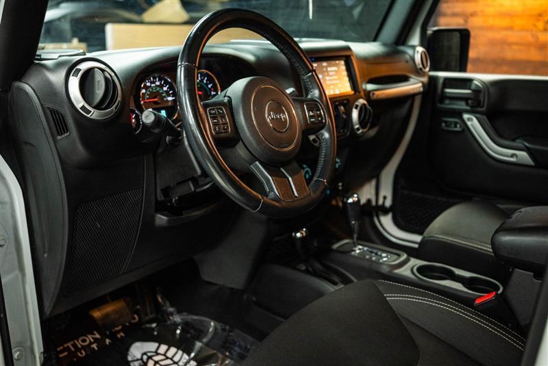 used 2016 Jeep Wrangler Unlimited car, priced at $20,197