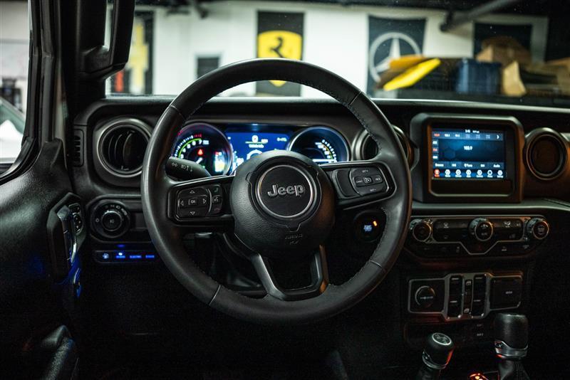 used 2023 Jeep Wrangler 4xe car, priced at $26,996