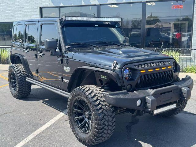 used 2012 Jeep Wrangler Unlimited car, priced at $17,488