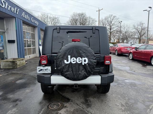used 2010 Jeep Wrangler Unlimited car, priced at $14,990