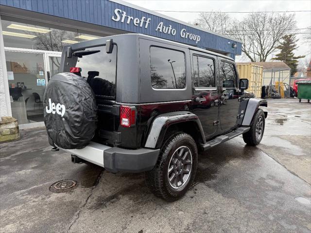 used 2010 Jeep Wrangler Unlimited car, priced at $14,990