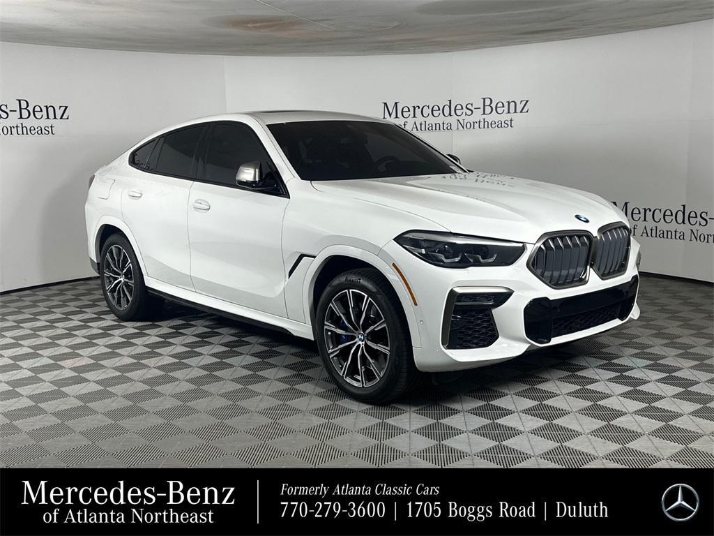 used 2022 BMW X6 car, priced at $49,458