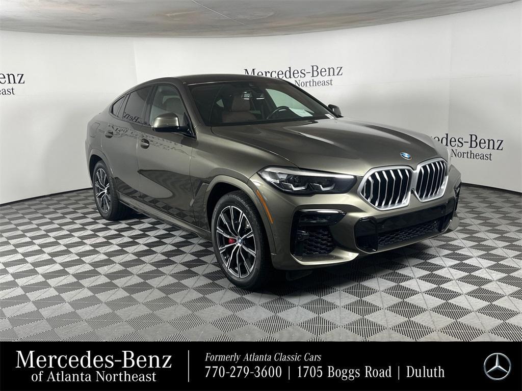 used 2023 BMW X6 car, priced at $55,271