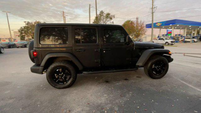 used 2021 Jeep Wrangler Unlimited car, priced at $27,395