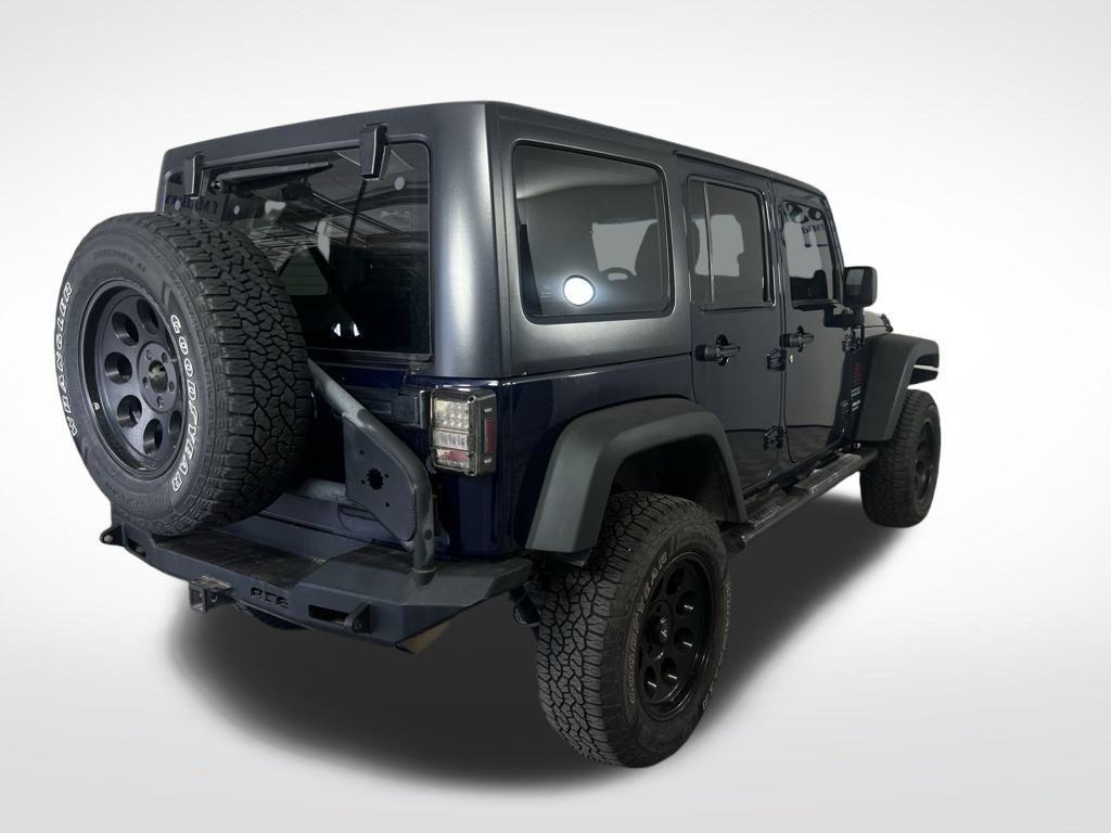 used 2013 Jeep Wrangler Unlimited car, priced at $15,069