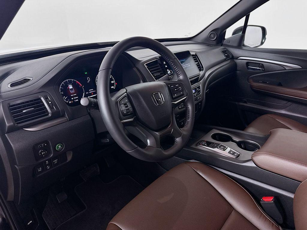 used 2025 Honda Ridgeline car, priced at $37,261
